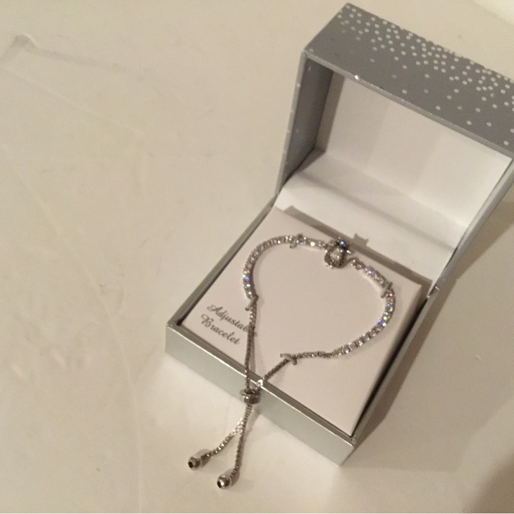 Silver Adjustable Tennis Bracelet with Clear Crystal Accents. Necklace